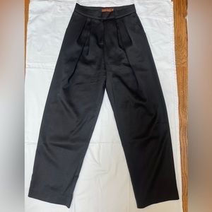 Black high rise satin trousers in size small